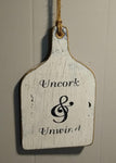 Vintage farmhouse style wooden cutting/bread board "Uncork & Unwind" hanging sm